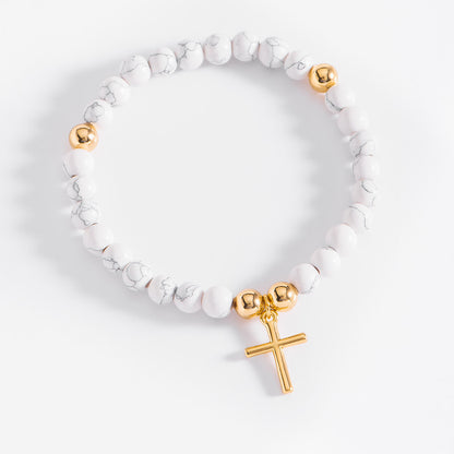 Pulsera con cruz color blanca