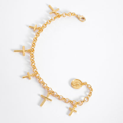 Pulsera en baño de oro serie de dijes