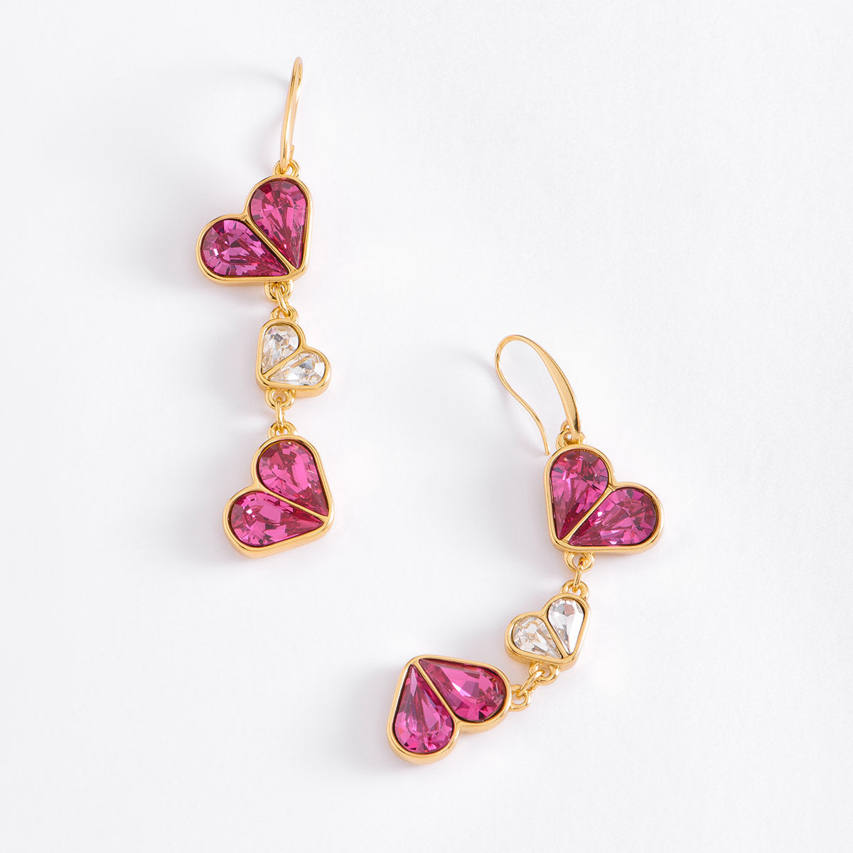 Aretes corazones fucsias