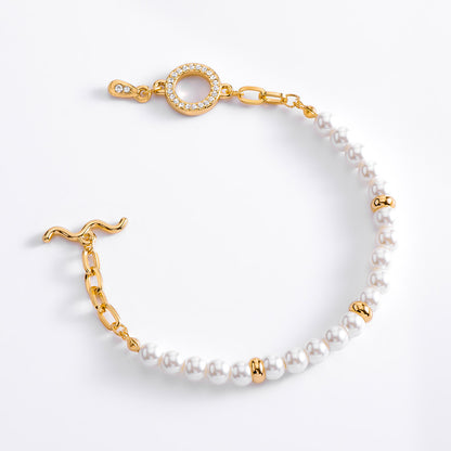 Pulsera con perlas y dorado